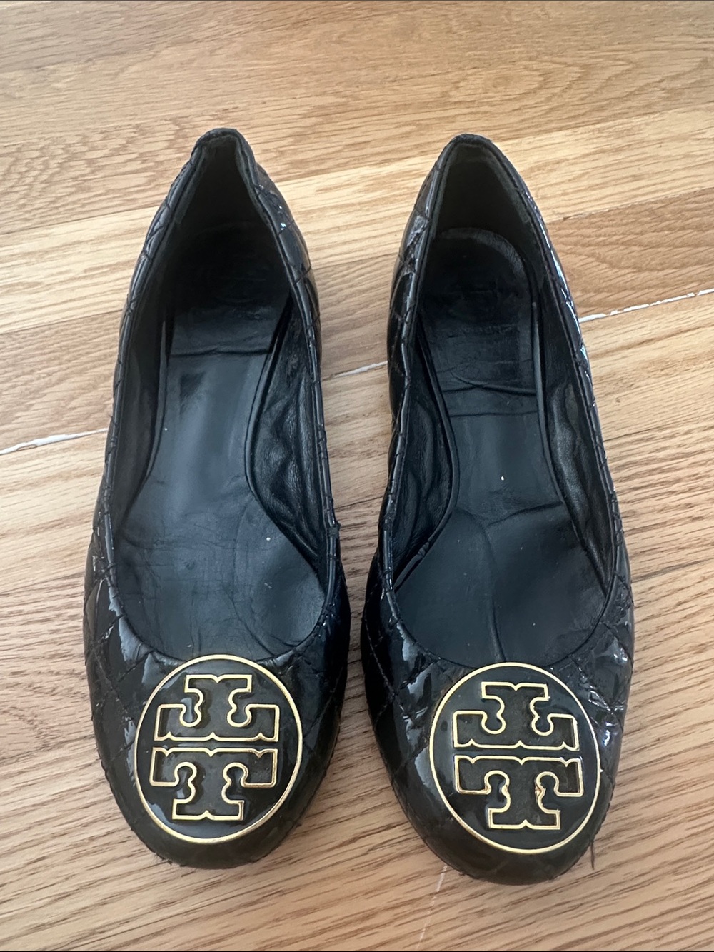 Tory Burch Black Quilted Logo Round-Toe Flats with Gold Emblem